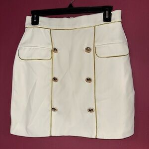 White mini skirt with gold details